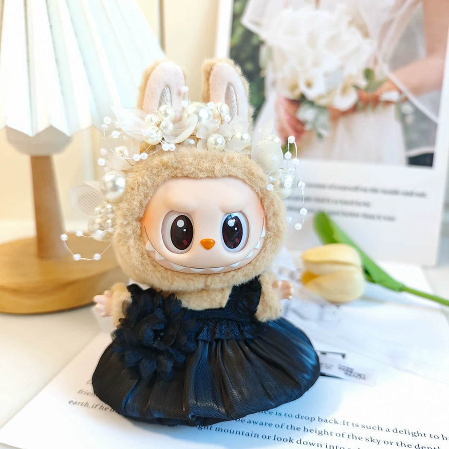 An image of black bud skirt with white pearl headband for labubu by Fig Palace