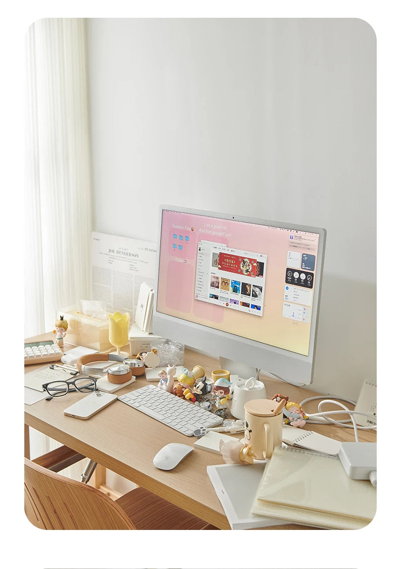 An image of a messy desk setup without monitor stand.