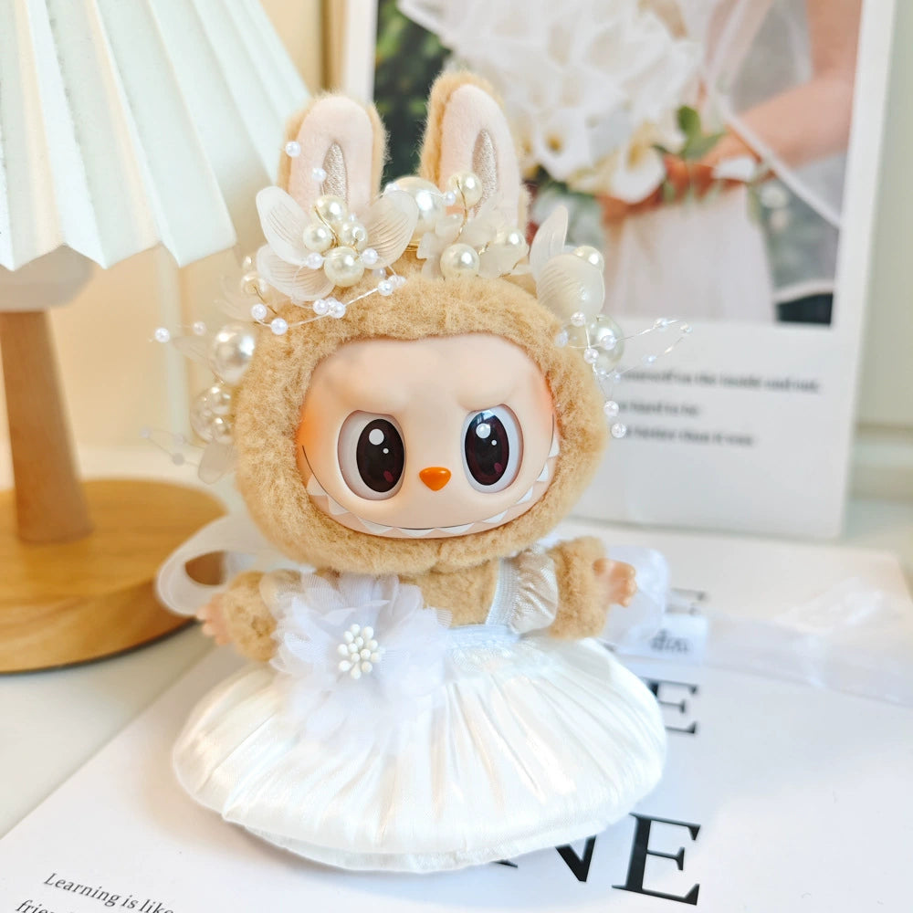 An image of white bud skirt with white pearl headband for labubu by Fig Palace