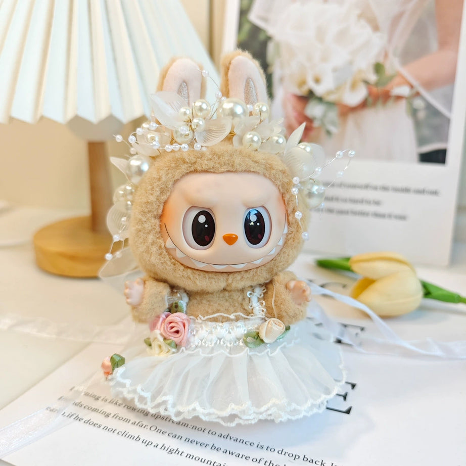 An image of white fairy skirt with white pearl headband for labubu by Fig Palace