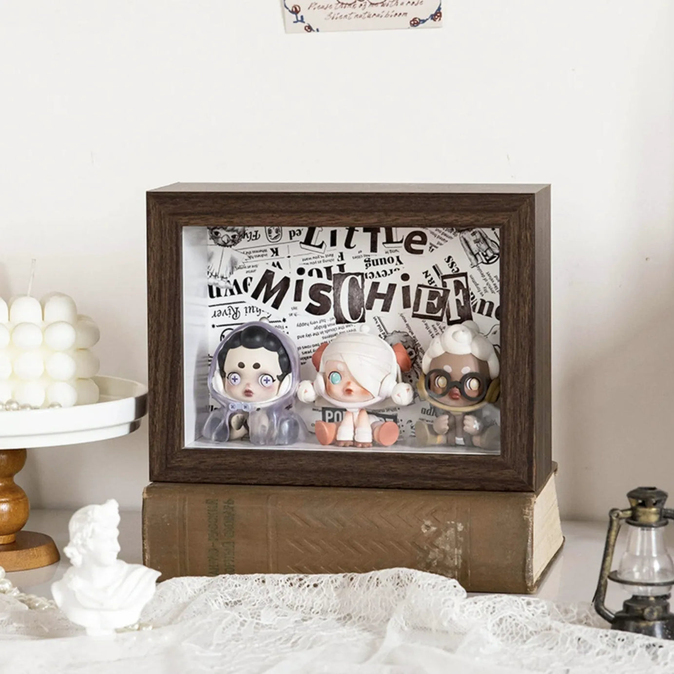 A squared walnut-colored wooden display case from Fig Palace with one layer, featuring a collection of designed Skullpanda figures from Popmart, each with distinct colors and styles,neatly arranged for display.