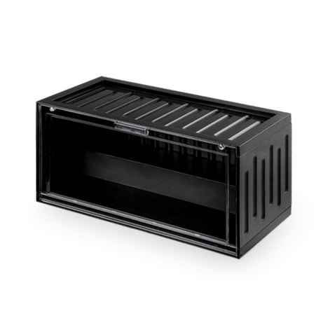 A single black rectangular acrylic display box with a transparent front panel, designed to store and display small collectible figurines. The box is empty, highlighting its spacious interior. 