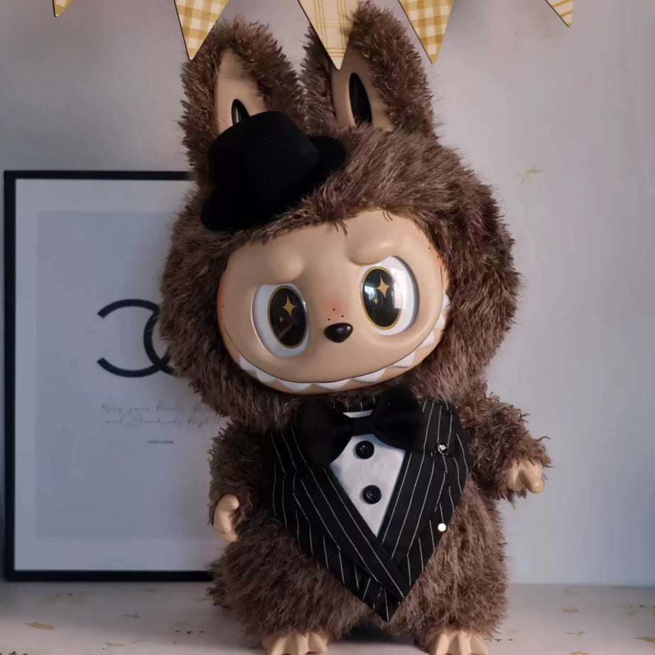 Zimomo in black gentlemensuits. 