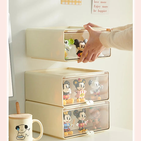 Zoomed-in view of drawer display box holding themed blind box toys in a creative diorama setup