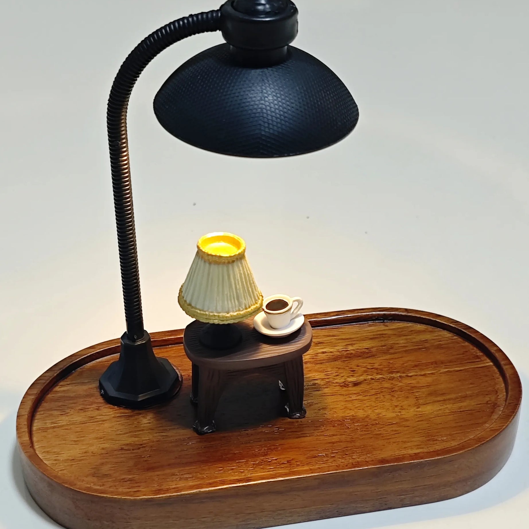 Minimalist wooden diorama base with only lamp, small table, and coffee cup displayed.