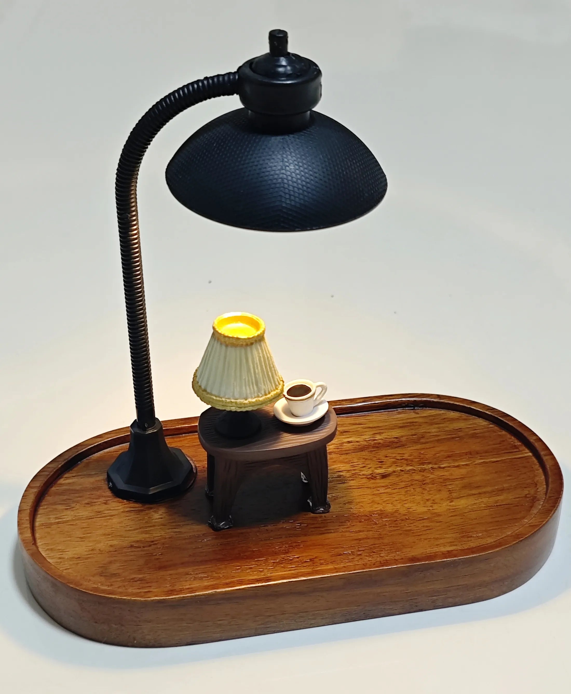 Minimalist wooden diorama base with only lamp, small table, and coffee cup displayed.
