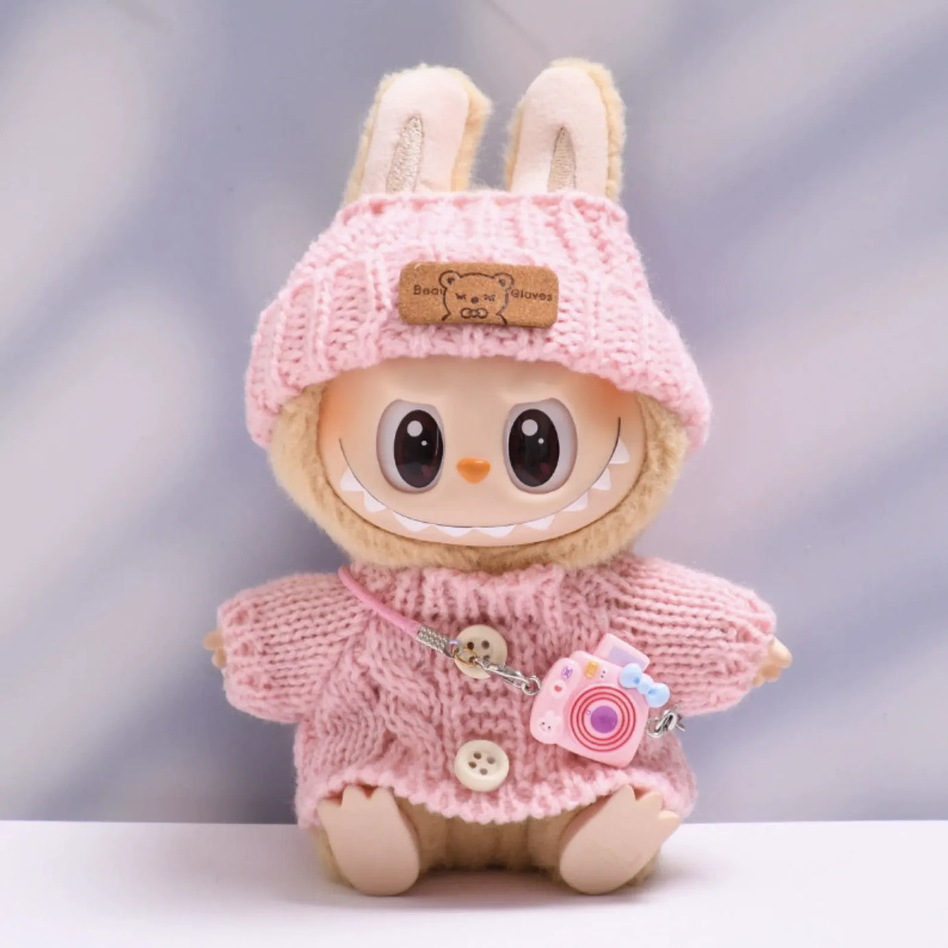 Light pink button sweater with light pink bear wool hat and light pink camera for Labubu v2 (POP MART THE MONSTERS Have a Seat Series Vinyl Plush Toys)