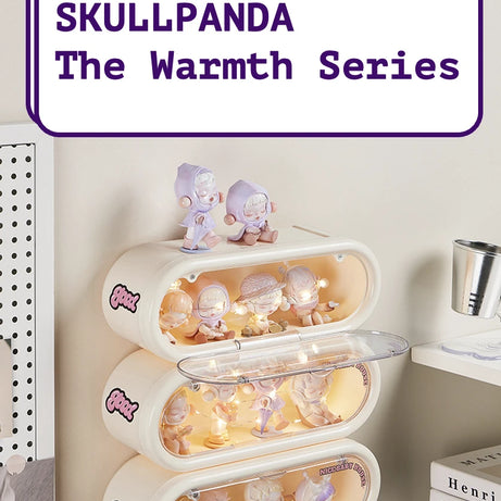 Triple-stacked creamy white display cases with flip covers, showcasing Pop Mart Skullpanda The Warmth Series. Label reads ‘Perfect for SKULLPANDA The Warmth Series.