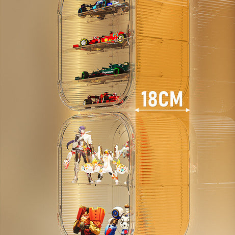 A collection of FigPalace transparent display boxes mounted on the wall, featuring collectibles like astronaut figurines and anime characters in multiple configurations.