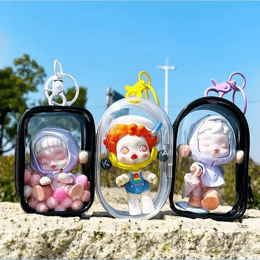 Three cute Pop Mart Figures are standing on the ground, inside FigPalace Display Bags. 