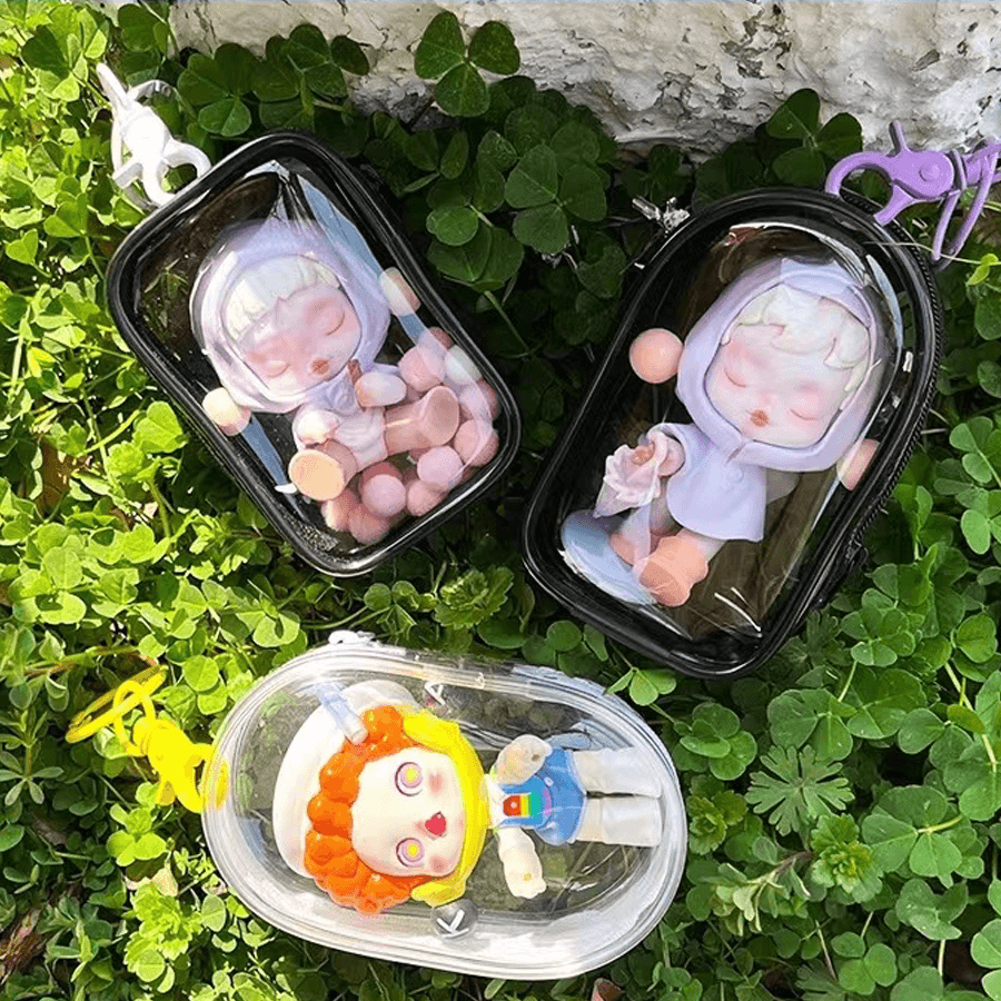 Three cute Pop Mart Figures are placing on the grassland, inside FigPalace Display Bags. 