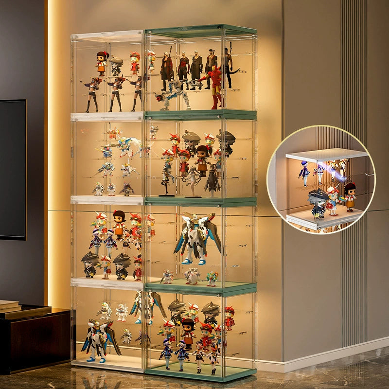 Four white display shelves stacked together and four green display shelves stacked together with figures placed inside. 